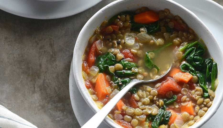 Slow-cooker creamy lentil soup freezer pack A close-up view of slow-cooker creamy lentil soup freezer pack in a bowl