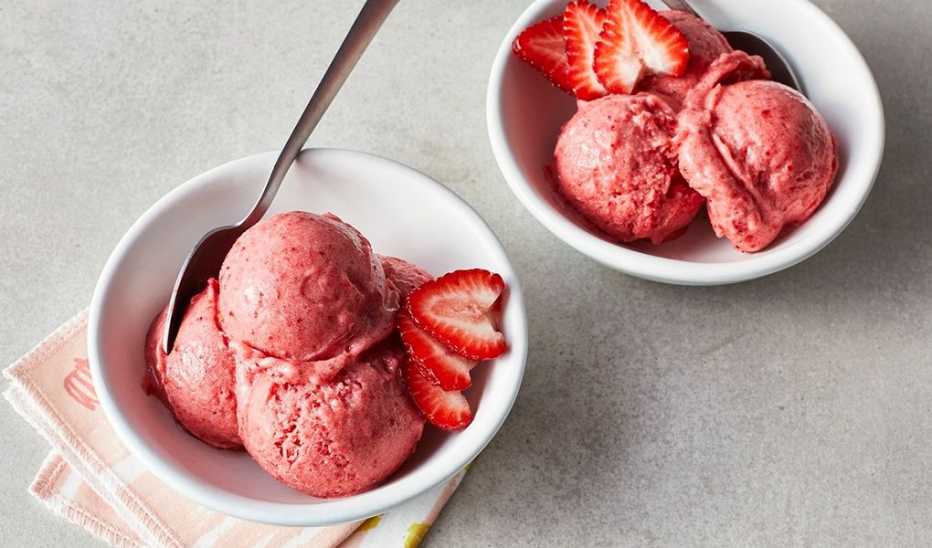 A close-up view of strawberry nice cream in a bowl
