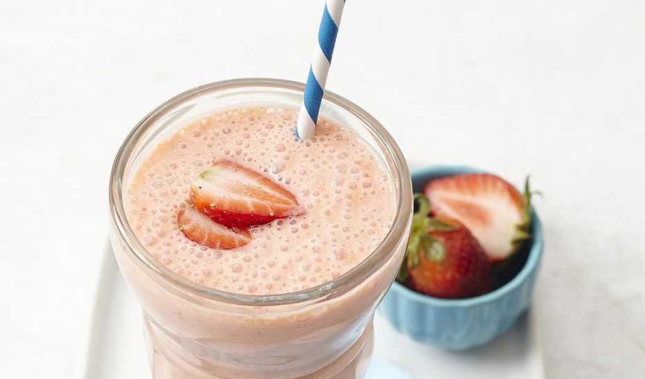 A close-up view of strawberry-banana protein smoothie in a glass A close-up view of strawberry-banana protein smoothie in a glass