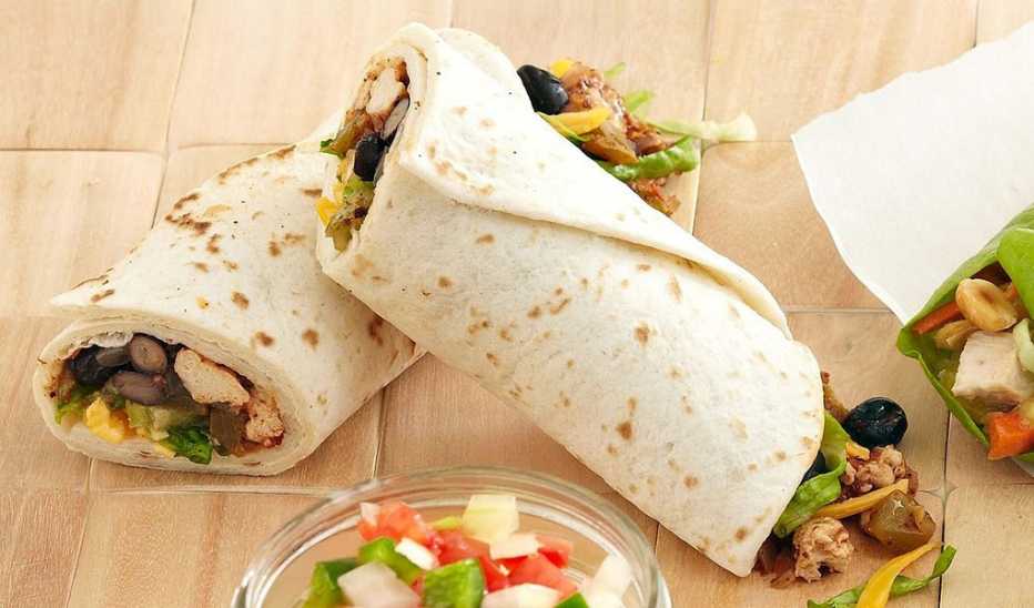 A close-up view of turkey and bean wraps