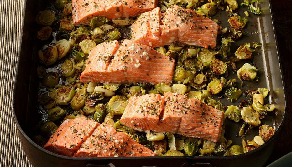 A close-up view of garlic roasted salmon and Brussels sprouts