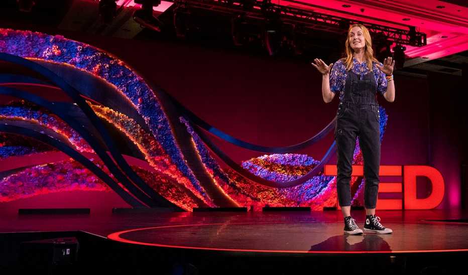 A woman, Christina Tosi, speaking on stage at SESSION 5 at TEDWomen 2021