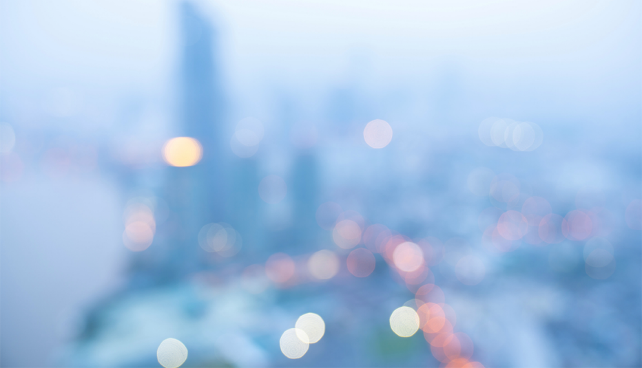 City lights blurred in the background