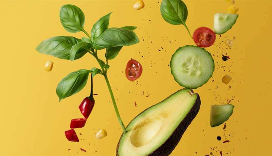 Avocados on a plain background