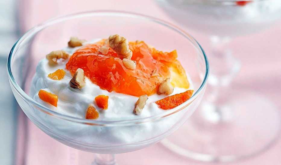 A close-up view of apricot yogurt delight in a glass