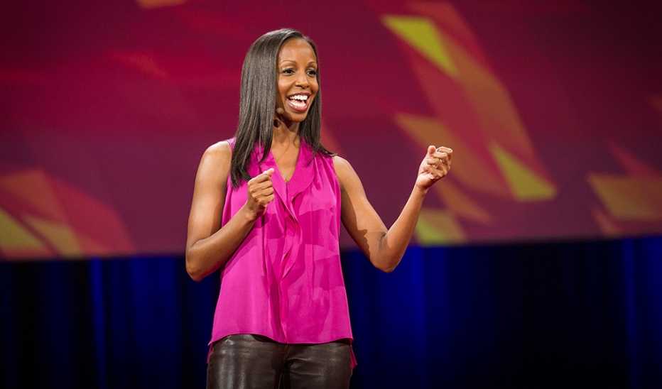 A woman, Sarah Lewis, speaking on stage at TED2014