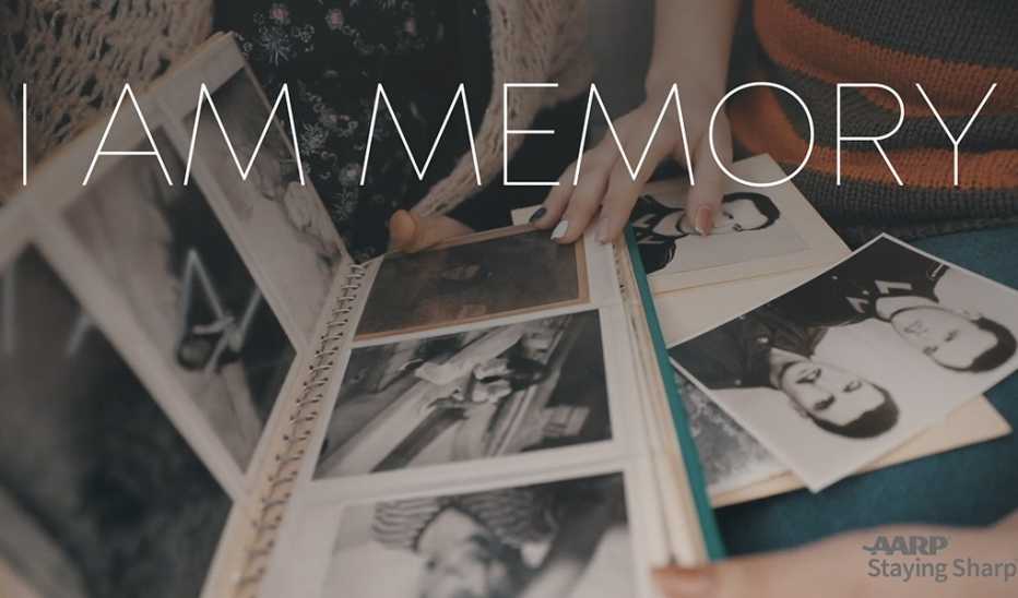 A photo album of pictures of people with "I Am Memory" text